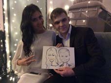 шарж держат Марина и Семен на свадьбе в ресторане Променад